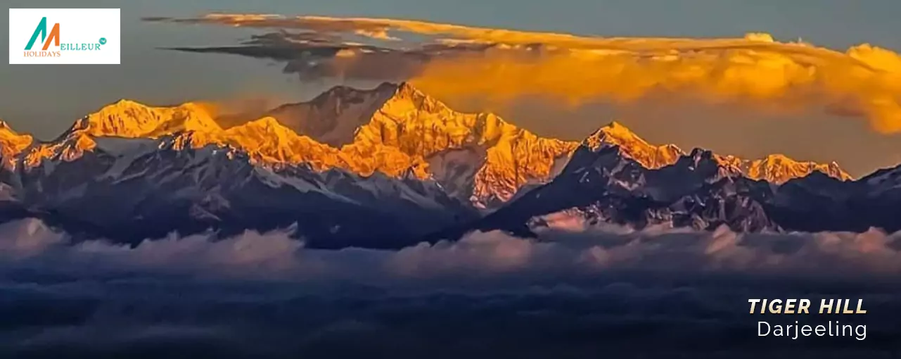 Sunrise over Tiger Hill in Darjeeling, showcasing snow-capped peaks, perfect for a Darjeeling tour package from Kolkata.