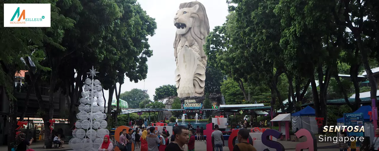 Bustling Sentosa, Singapore with the iconic Merlion statue - a must-visit on any Singapore Malaysia tour package.