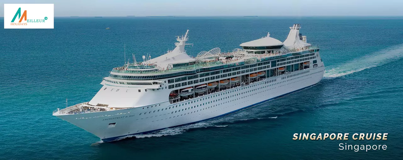 A white cruise ship sails in calm blue waters with amenities, part of a Singapore tour package with cruise.
