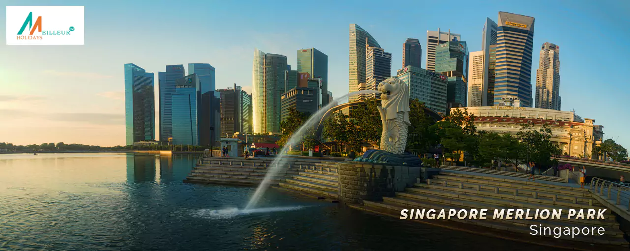 Singapore Merlion Park sparkles at dusk, a serene stop on the Singapore tour package with cruise.